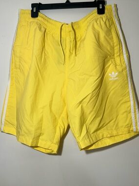 Adidas swim shorts in yellow